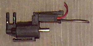Three port vacuum switch